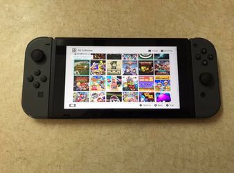 NINTENDO SWITCH V2 with 125 SWITCH GAMES and 7500 RETRO GAMES