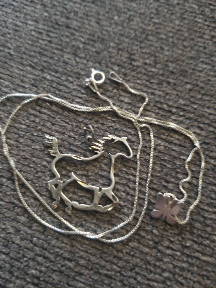 Sterling silver butterfly necklace and sterling horse pendant.