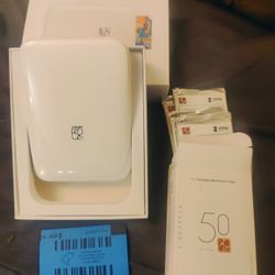 ZINK MINI THERMAL HAND HELD COLOR PRINTER And 5 PACKS OF PHOTO PAPER