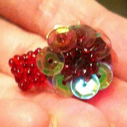 Red Beaded Stretch Flower Ring with Sequence. 