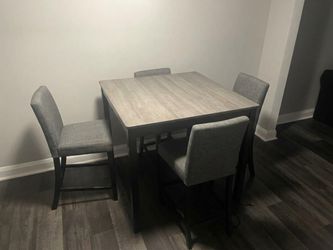 5 Piece dining table with matching chairs