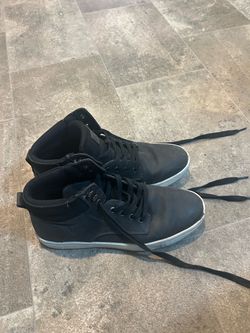 Black high top sneakers