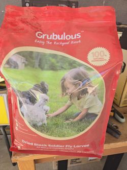 Grubulous brand dried black soldier fly larvae is marketed as a 100% natural chicken treat to boost egg production and support feather health