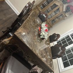 high end luxury marble dinner table and 6 chairs 