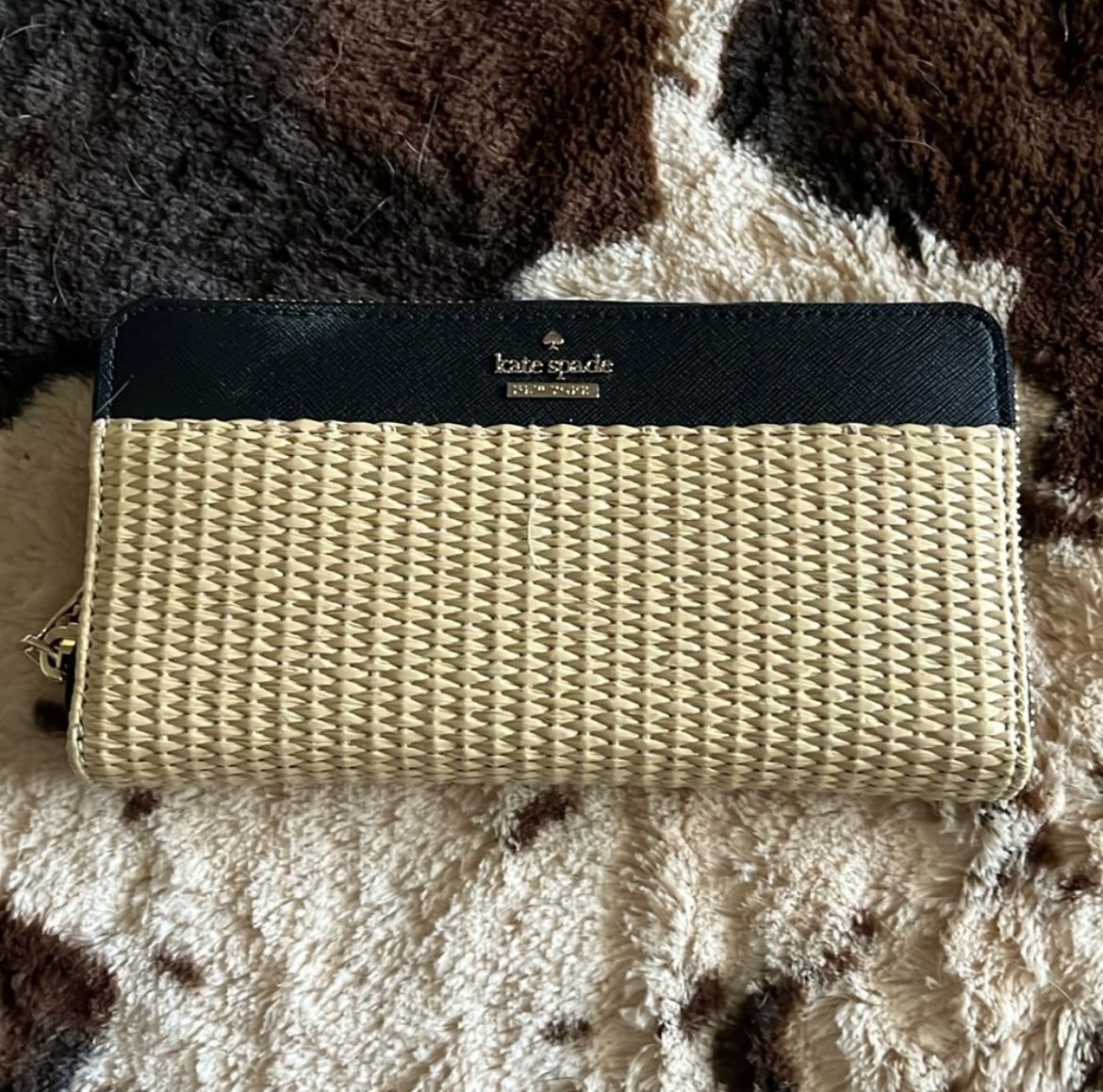 Black and weaved Kate Spade clutch