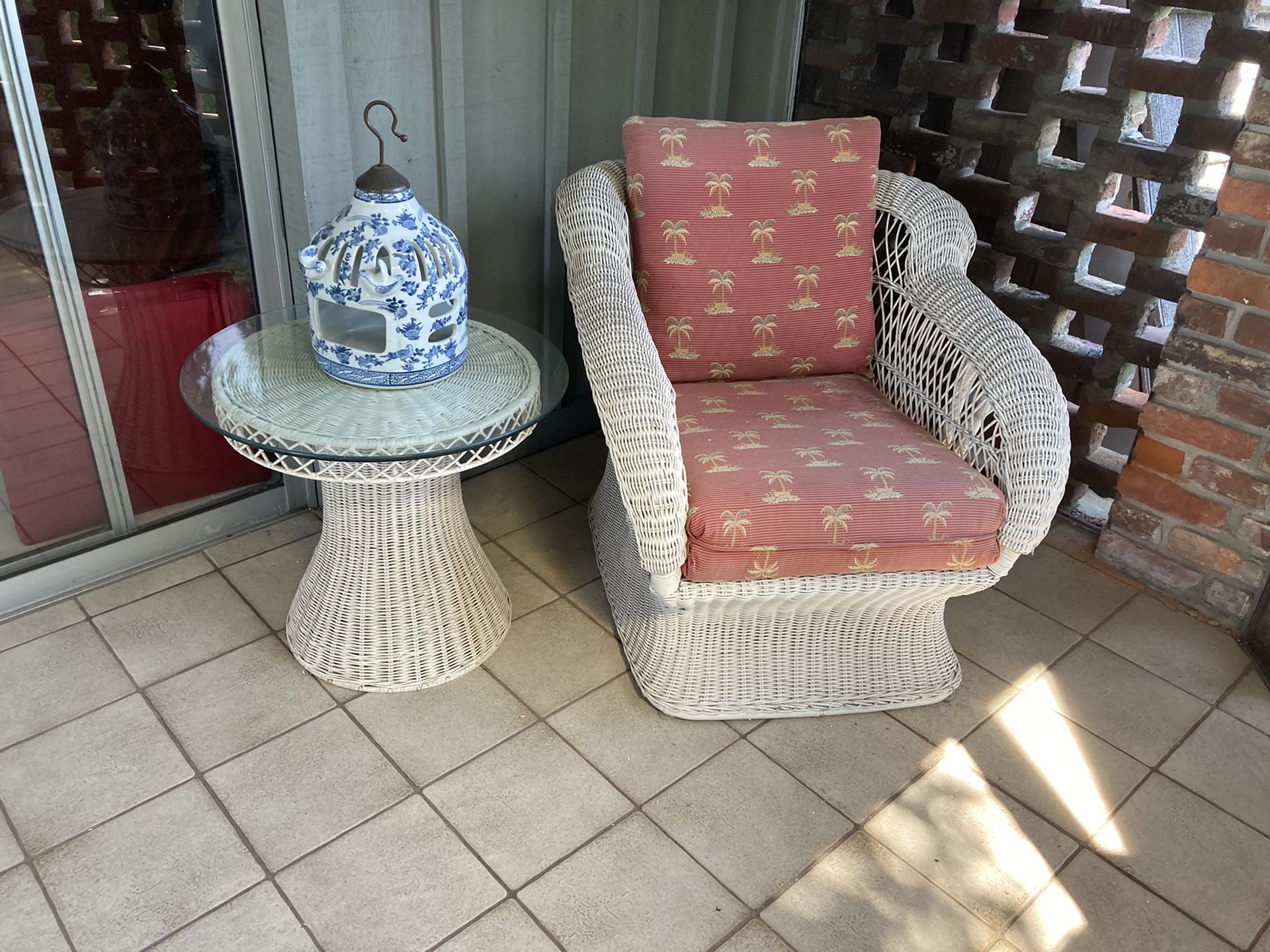 White wicker sofa, chair and tables
