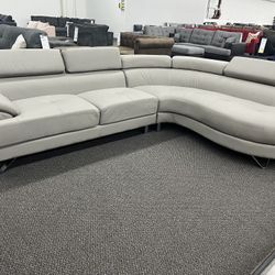 New Sectional W Curved Corners/Adjustable Headrests.  125x 85x29x34H.  Grey.  Free Delivery!