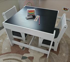 Kids table and 2 chairs with storage