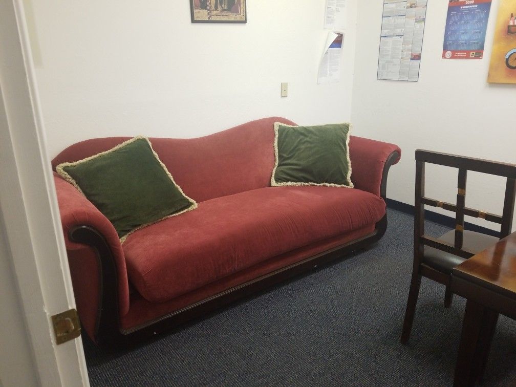 Red Couch With 2 Pillows