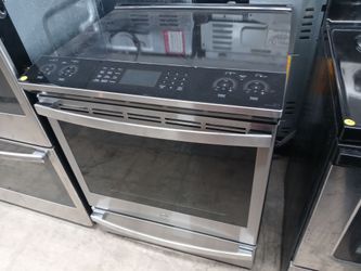 GE stainless steel induction glass-top slide-in range - Free delivery