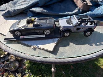 Diecast cars, Lamborghini, and Jeep bronco
