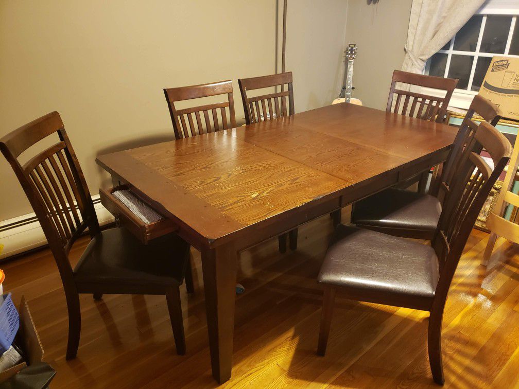 Solid Wood Table w/ 6 lether seat chairs