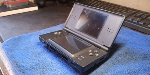 Nintendo DS Lite Handheld Tested and working (for parts or repair)