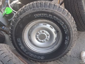 Goodyear Wrangler TD Tire on Steel Rim