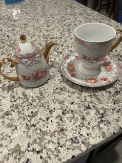 Teapot with Matching Cup and Saucer