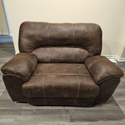 Brown oversized recliner chair