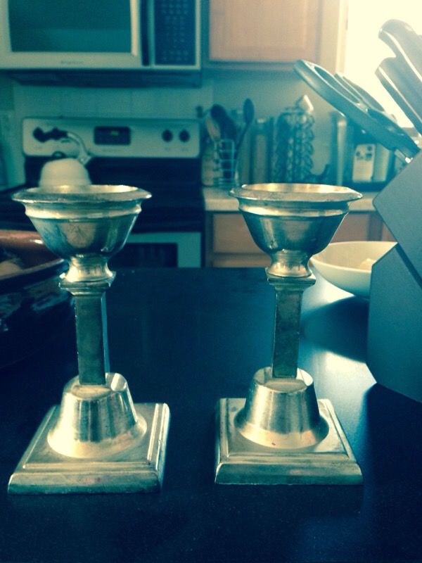 Silver colored candle holders