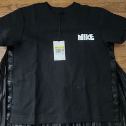 brand new Nike x Sacai short sleeve top in black, size small