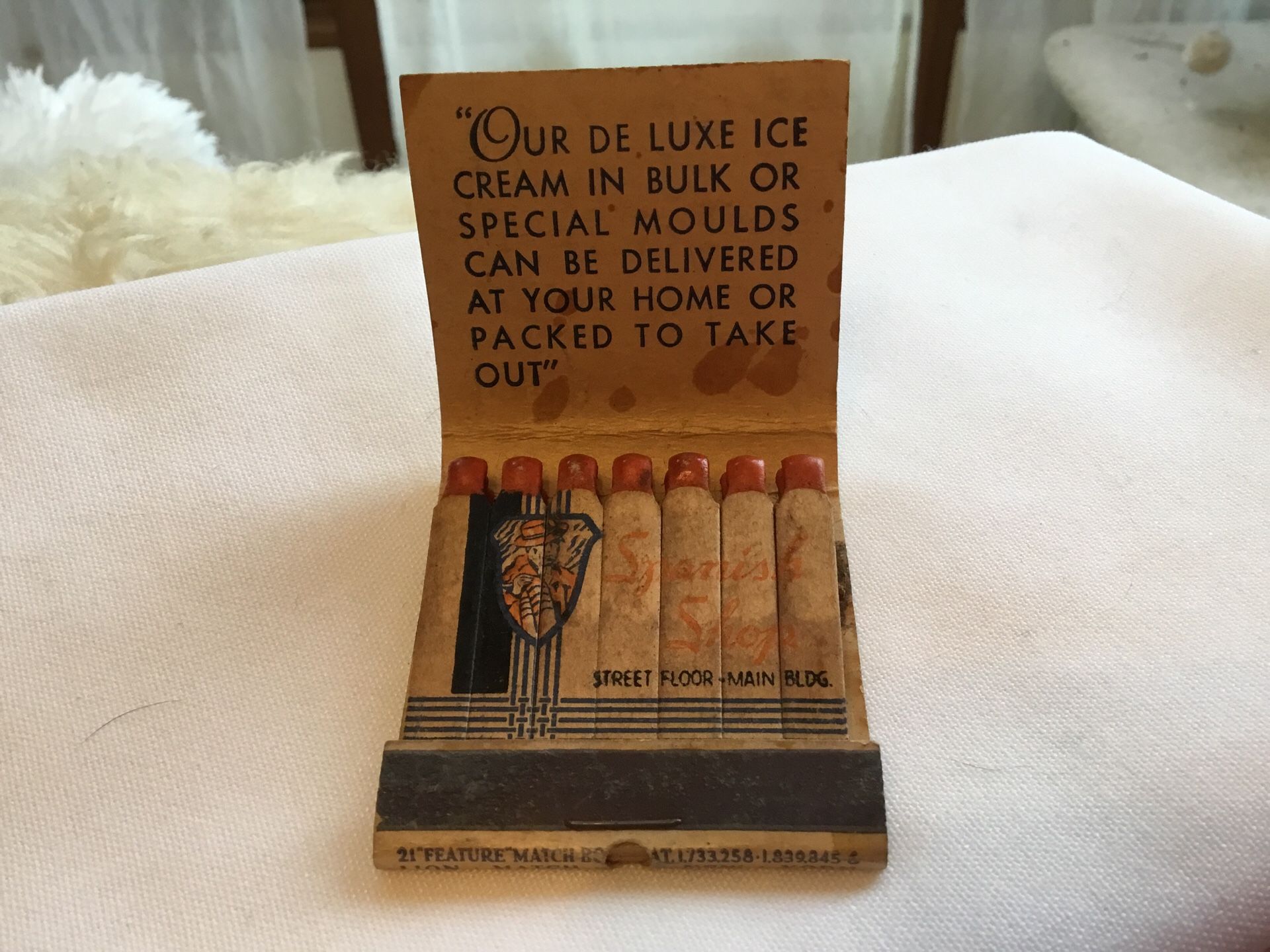 VTG LION MATCH FEATURE MATCHBOOK with ALL MATCHES. SPANISH SHOP-JORDAN MARSH CO. BOSTON, MASS $17