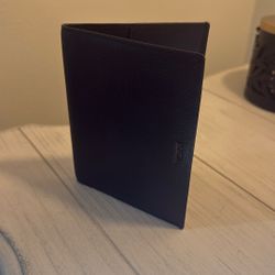 2 Black Leather TUMI Passport Holders. 