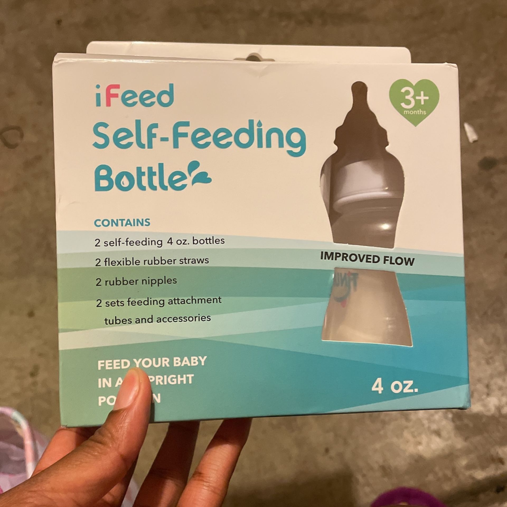 Self feeding baby bottles