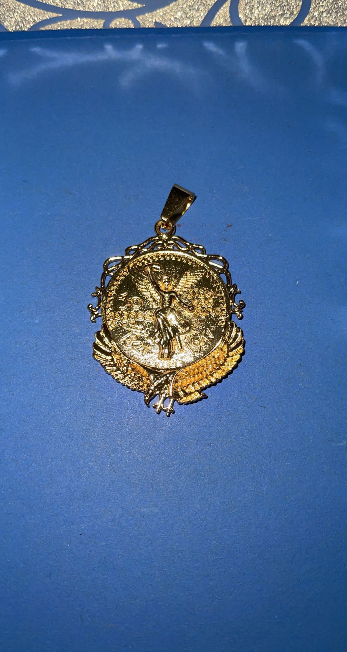 beautiful centenary.  pendant for chain.  gold plated.  good quality