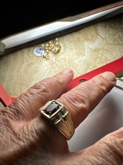 10 kt genuine gold , diamonds & ruby ring  price is firm NO offfers  please