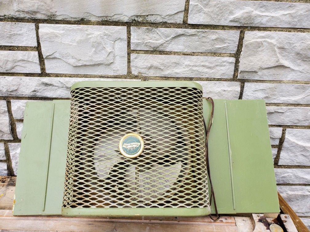 Cool vintage window fan.