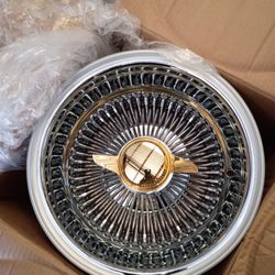 Chrome 100 Spoke w/  Gold spinners 13x7 rev $1600.