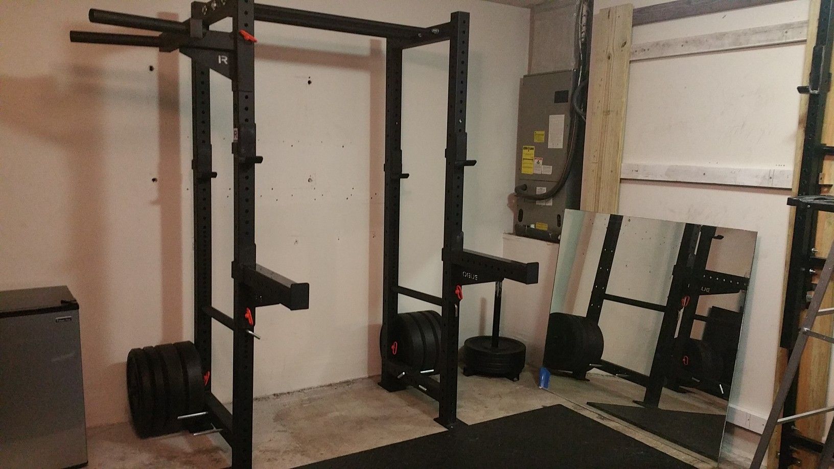 Rogue Fitness RML3 squat rack, 4 J cups, 2 spotter arms, 2 plate storage, 4 jpegs, matador dip attachment and 320 LBS Hi-Temp Bumper Plates