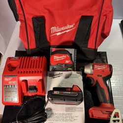 Milwaukee Impact Driver with 25ft. Tape Measure, Battery and Charger 