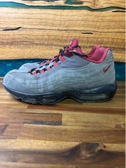 Nike Air Max 95 Essential sneakers feature a primarily gray suede Men’s 12