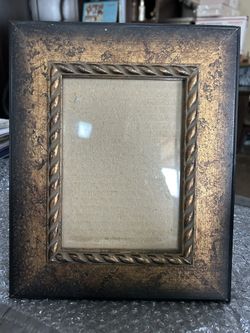 Pretty Wood Frame In Good Condition.  Holds 5” x 7”