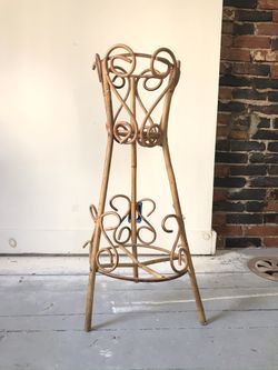 Vintage rattan pedestal plant stand