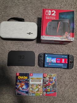 Nintendo switch 2 with box, 3 games, carry case, dock all cords