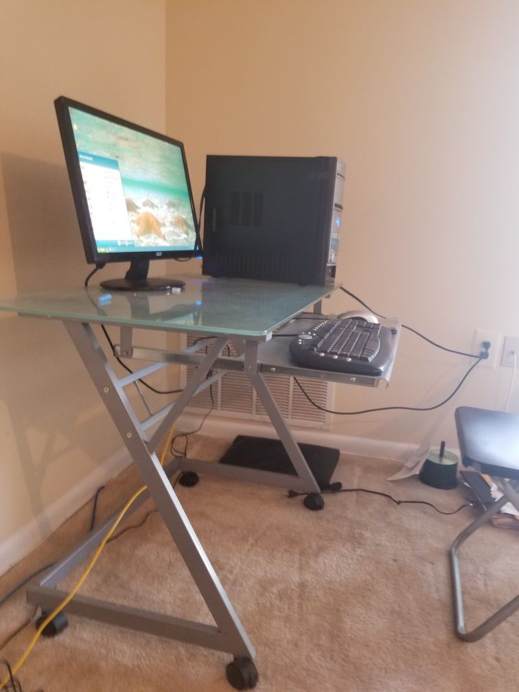 Computer desktop with screen and table