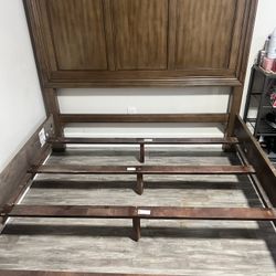 Queen-size wooden bed 