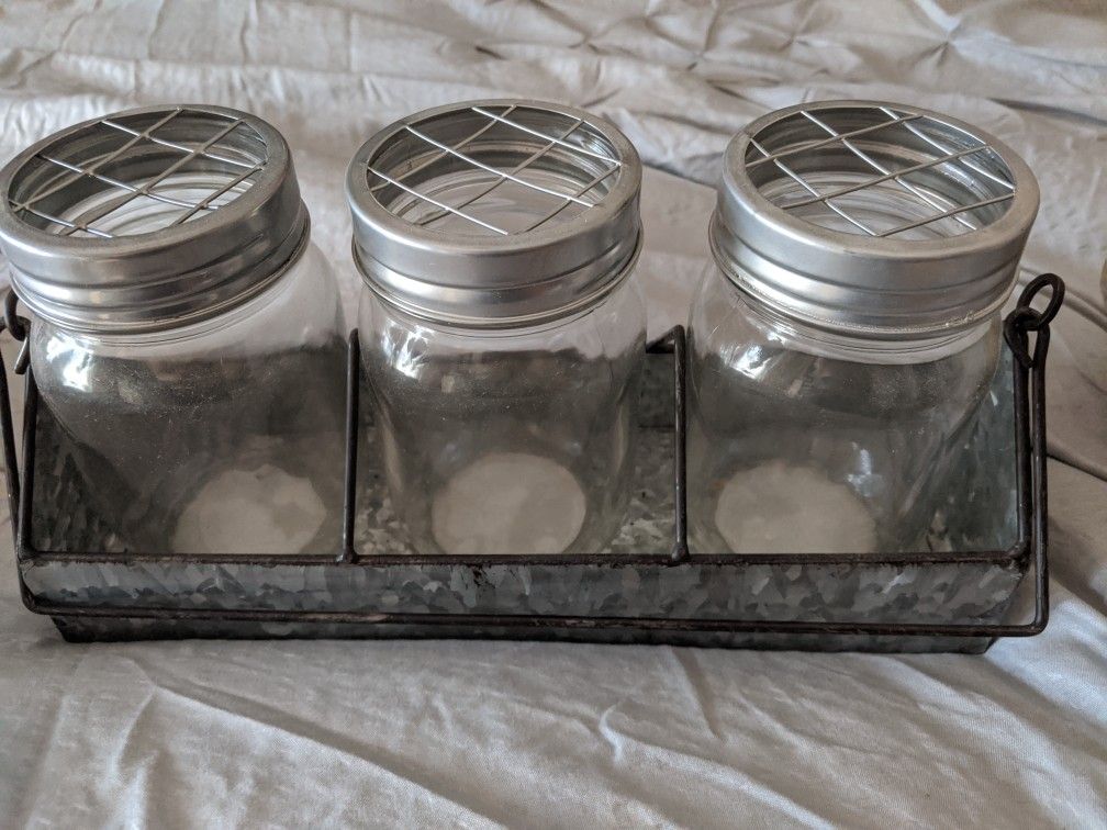 Glass jars with metal holder. $5 firm