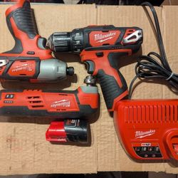 Milwaukee M12 Drill Driver/Impact Driver Multi Tool battery and charger