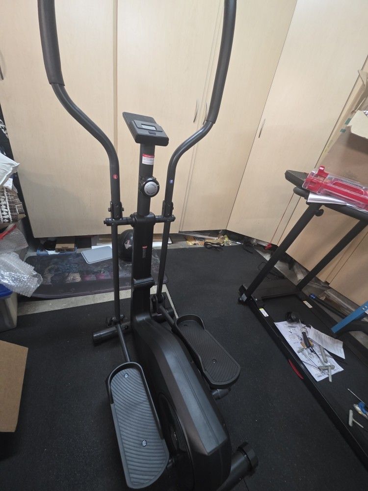 Compact home elliptical machine. 