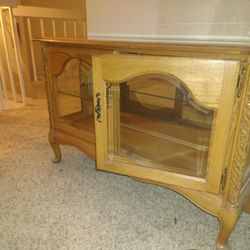 WOOD BUFFET WITH GLASS CABINET WITH DOORS AND LIGHTS INSIDE THE STORAGE SPACE