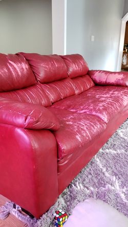 Red faux leather couch