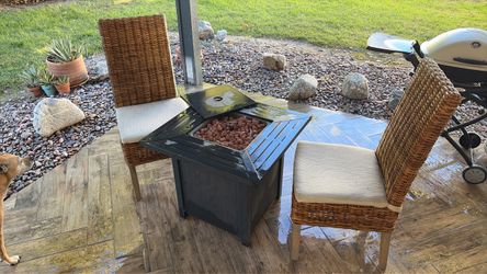 2 chairs and a fire pit