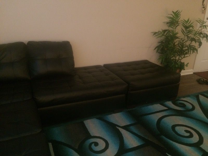 Black lather sectional couch