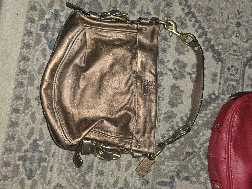 Gold Coach Handbag