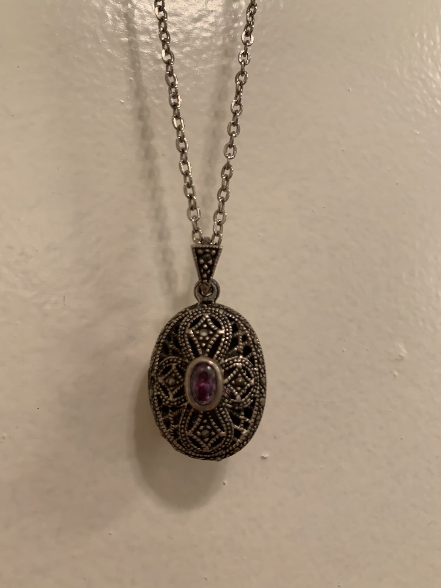 Marcasite & Silver Locket With Amythyest Stone In The Center. Chain Is 20” Long