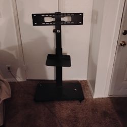 Movable TV Stand On Wheels. 