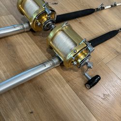 pair of Penn international II 50 SW, wide two speed FISHING RODS and Reels