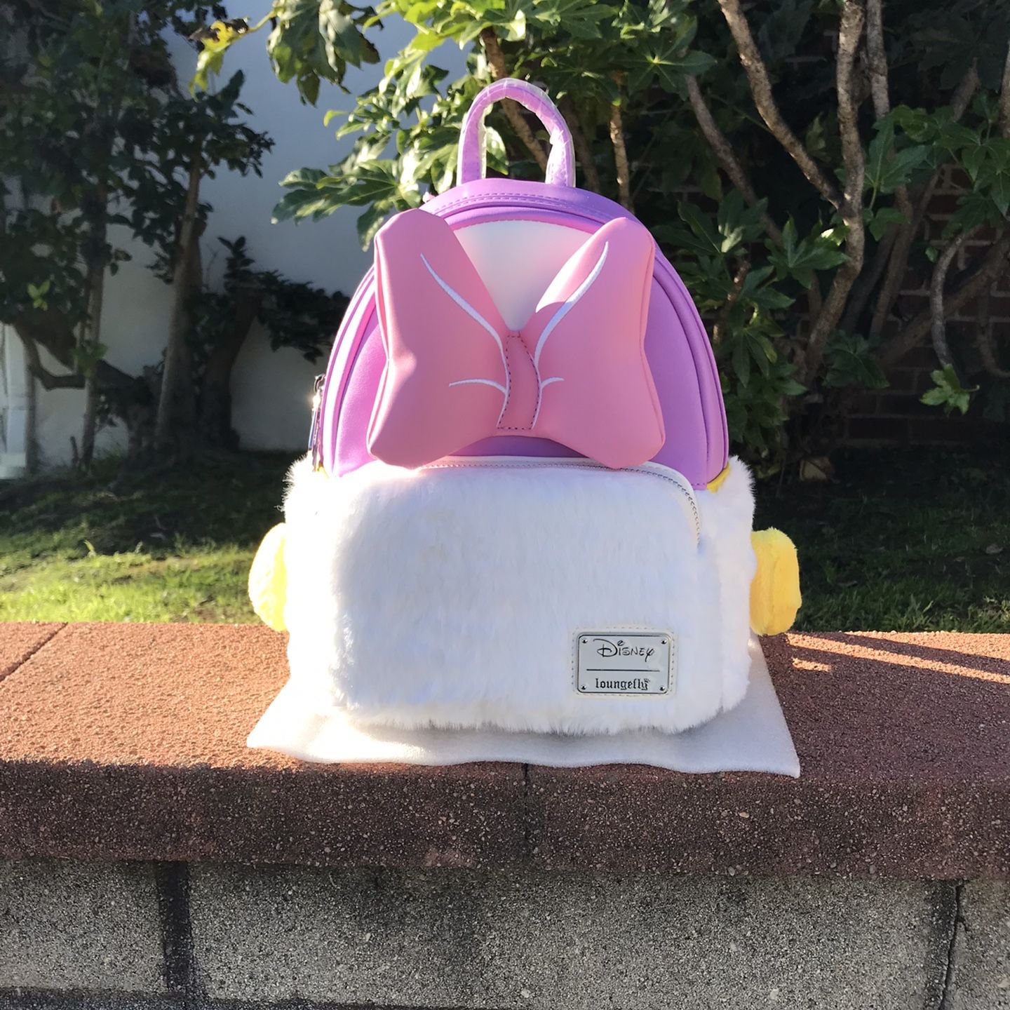 daisy duck loungefly mini backpack Donald & Duck Hearts Casay LLC Crafted with exquisite attention to detail Daisy Duck 85th Anniversary Sequin