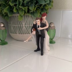Bride and groom cake topper
